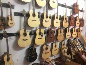 Đàn Ukulele Và Guitar Shop