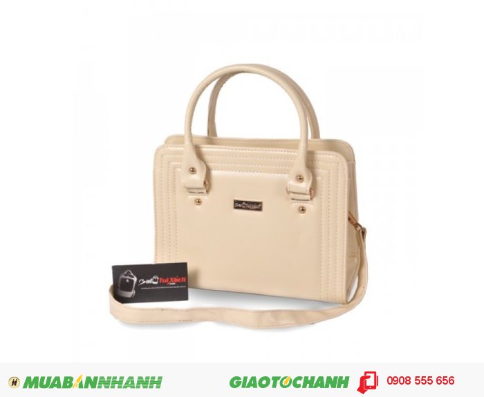 Túi xách dằn chỉ BLTXV1014001 | Giá: 193,600 đồng | Loại: Túi xách | Chất liệu: Simili (Giả da) | Màu sắc: kem | Kiểu quai: Quai xách |Họa tiết: Trơn | Trọng lượng: 500g | Kích thước: 25x19x11 cm | Mô tả: Túi xách được làm từ chất liệu silimi cao cấp đảm bảo độ bền và đẹp. Đường chỉ may nổi ba vòng bao quanh bên ngoài vô cùng bắt mắt, vừa đảm đảo độ bề vừa mang tính thời trang. Kiểu dáng đơn giản nhưng rất thời trang, phù hợp cho những cô nàng văn phòng, đi dự tiệc hay đi dạo phố. Túi xách dằn chỉ thời trang cho bạn gái là một sự lựa chọn đáng tin cậy phù hợp với nhiều độ tuổi khác nhau mà vẫn thật thời trang., 3