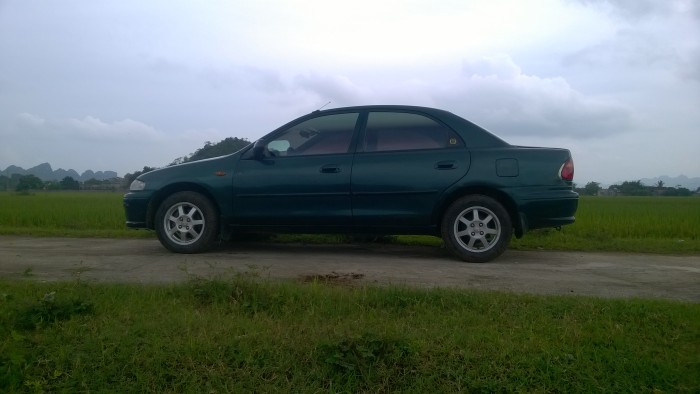 Cần bán xe mazda323 đời 1998