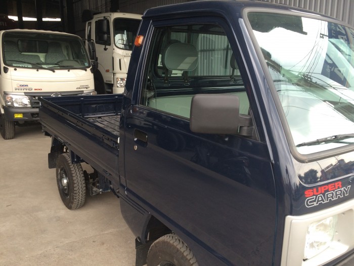 Cần bán xe SUZUKI thùng lửng 650 kg, trả trước 30% nhận xe ngay