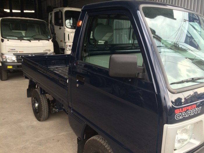 Cần bán xe SUZUKI thùng lửng 650 kg, trả trước 30% nhận xe ngay