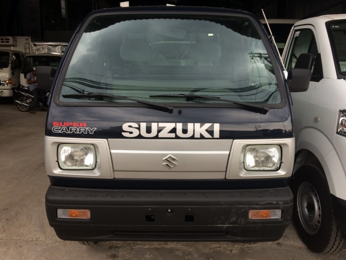 Cần bán xe Suzuki 650 kg thùng lửng màu xanh, giao xe ngay