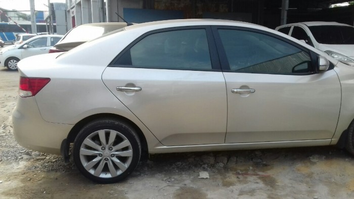 Kia Forte 2013MT màu vàng bản đủ