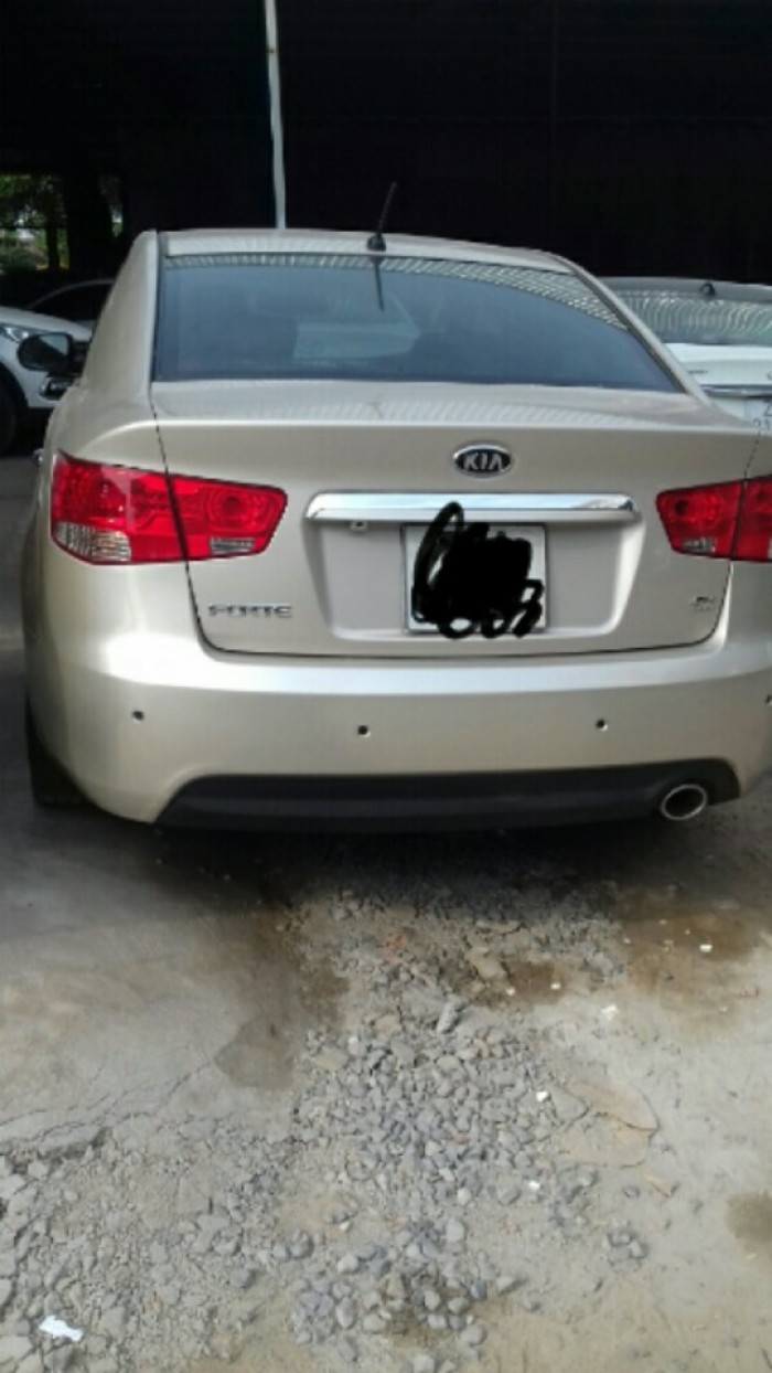 Kia Forte 2013MT màu vàng bản đủ