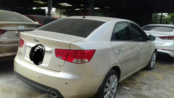 Kia Forte 2013MT màu vàng bản đủ