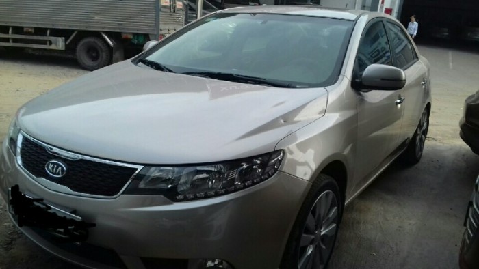 Kia Forte 2013MT màu vàng bản đủ
