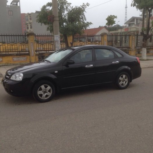 Gia đình cần bán xe Daewoo lacetti đời 2009, màu đen, biển hà nội 4 số.