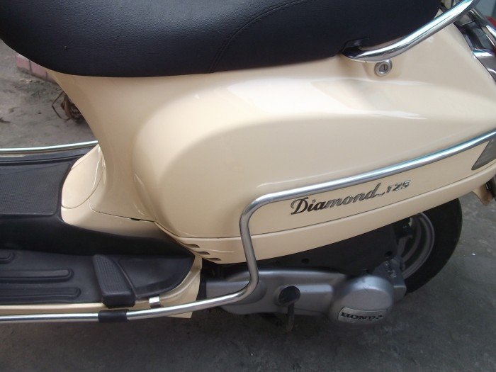 Cần bán Vespa Lx 125cc h onđa FI két nước màu vàng be xe chính hảng honđa nhập khẩu