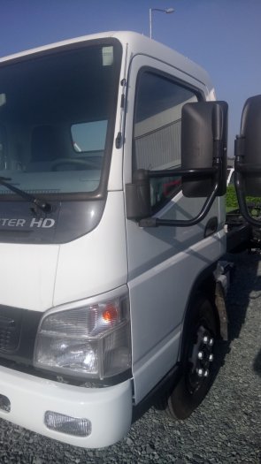 Cần bán gấp xe tải fuso canter hd8.2 tải trọng 4 tấn 5 thùng mui bạt chỉ với giá 180 triệu