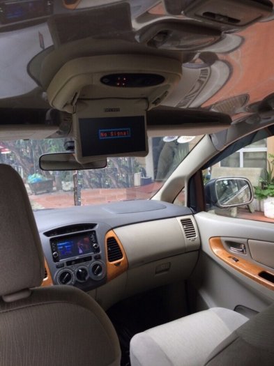 Cần bán Toyota Innova G 2009 màu nâu vàng