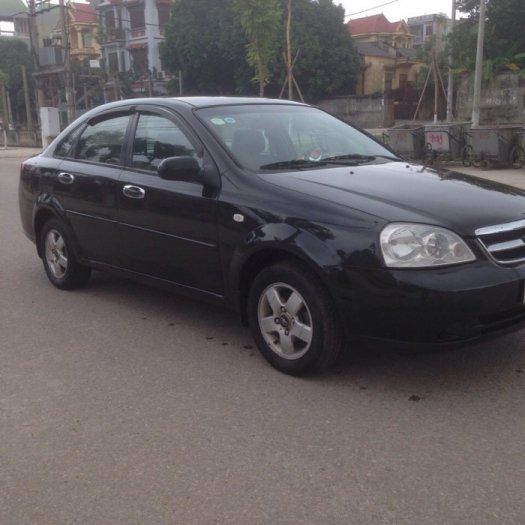 Gia đình cần bán xe Daewoo lacetti đời 2009, màu đen, biển hà nội 4 số.