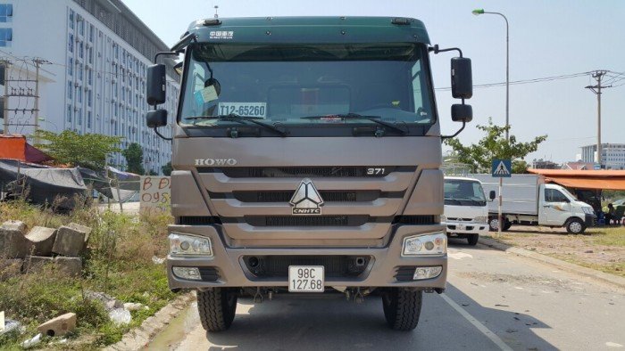 Xe tải ben 4 chân howo 12 nhíp thùng đúc