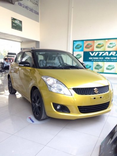 Bán xe Suzuki Swift RS mầu vàng chóe!