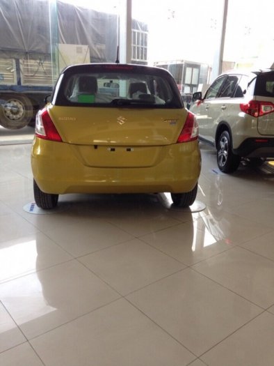 Bán xe Suzuki Swift RS mầu vàng chóe!
