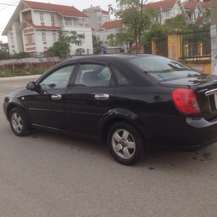 Gia đình cần bán xe Daewoo lacetti EX đời 2009, màu đen, chính chủ