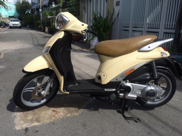 Piaggio Liberty 2k12,máy zin, ngay chủ,màu vàng kem.