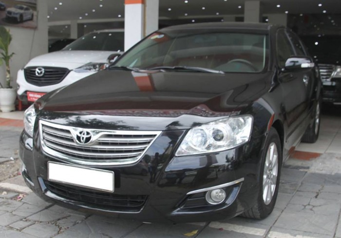 Toyota Camry 2.4G 2007 mầu đen nội thất kem lắp dáp trong nước, đi được 8 vạn KM.