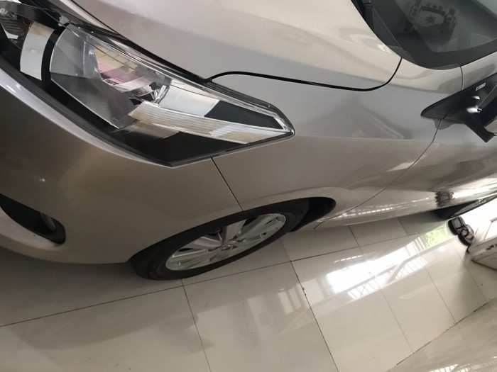Cần bán xe Vios 2016 số tự động màu vàng cát trang bị full option