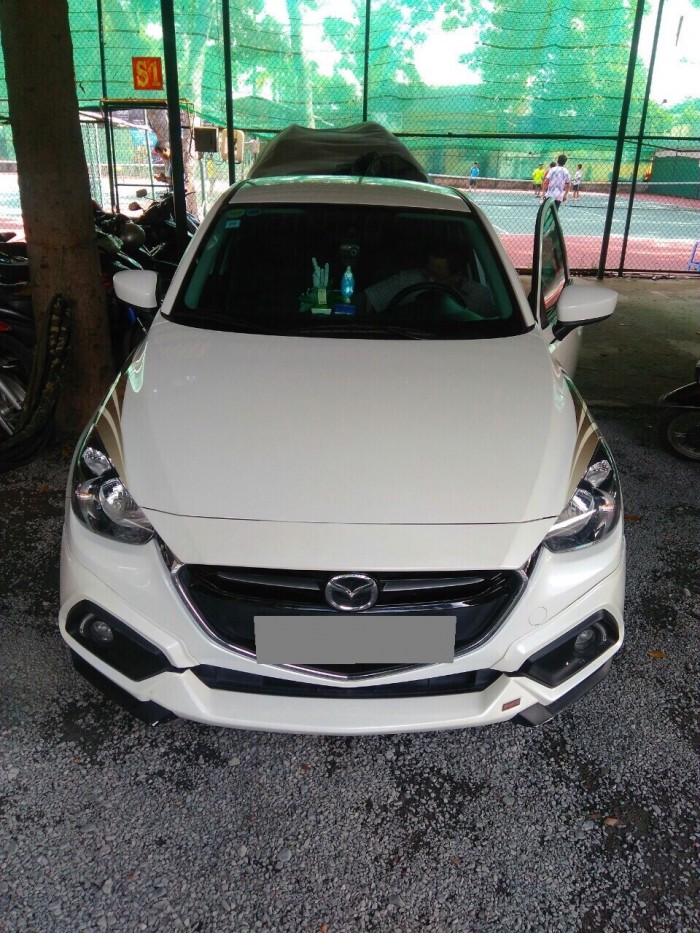 Nhà cần tiền bán Mazda 2 2016 màu trắng, 515tr