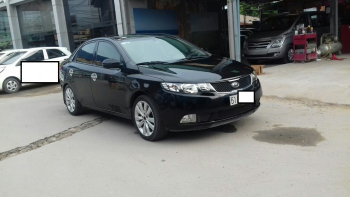 Bán Kia Forte  SX 1.6MT 2011 màu đen biển SG đúng chất