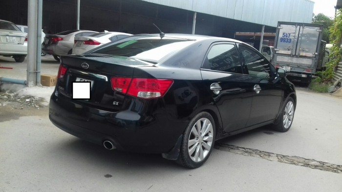 Bán Kia Forte  SX 1.6MT 2011 màu đen biển SG đúng chất