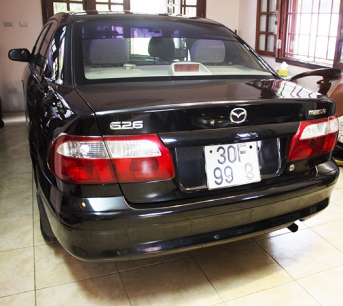 Cần bán Mazda 626 đời 2005 màu đen xe gia đình giá chỉ 175 triệu