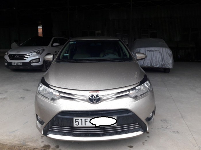 Bán Toyota vios  E 1.5MT màu hồng phấn biển SG 2015