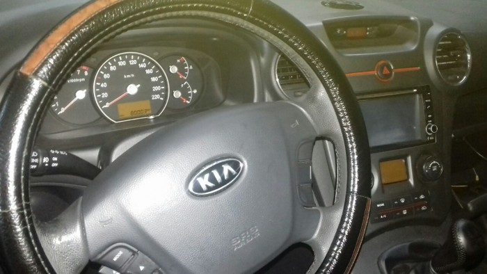 Bán Kia Carens 2.0MT SX 2012 màu trắng BSTP