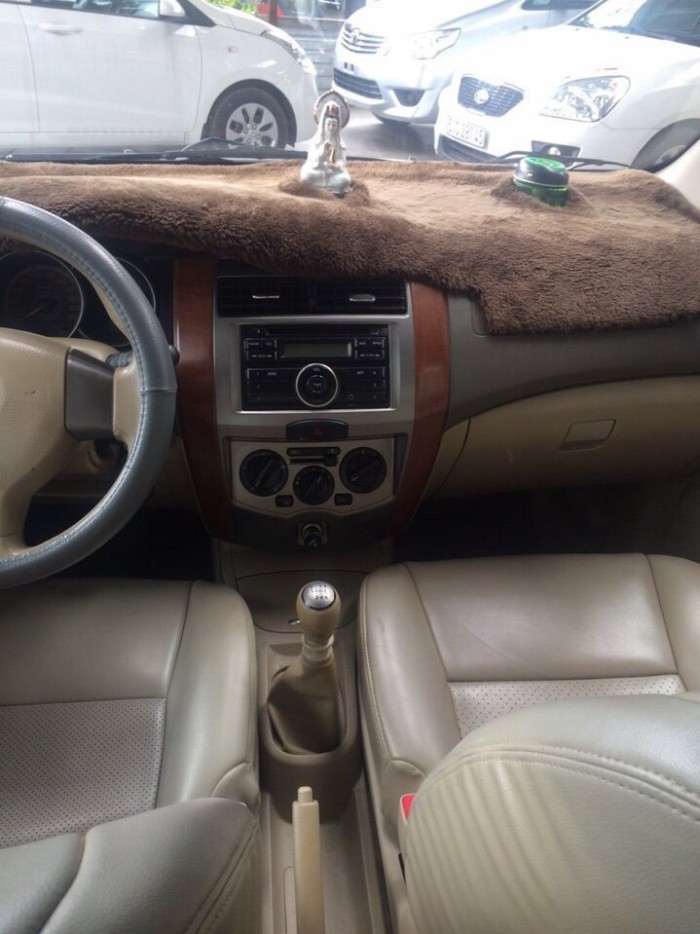 Bán Nissan Grand Livina 7 chỗ số sàn 2010 màu vàng cát biển SG