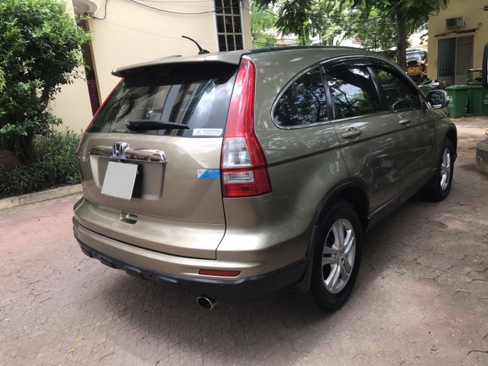 Bán xe Honda CRV còn mới, xe đẹp sx 2011 bản 2.4 tự động màu vàng cát.