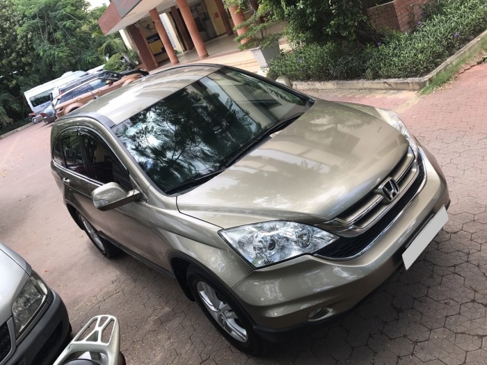 Bán xe Honda CRV còn mới, xe đẹp sx 2011 bản 2.4 tự động màu vàng cát.