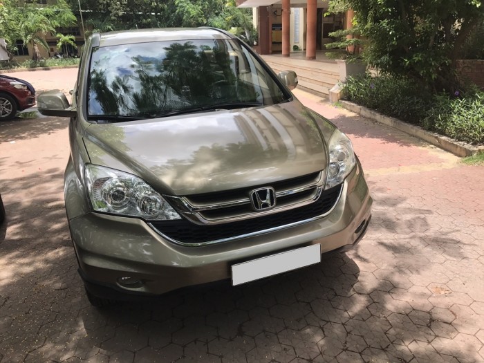 Bán xe Honda CRV còn mới, xe đẹp sx 2011 bản 2.4 tự động màu vàng cát.