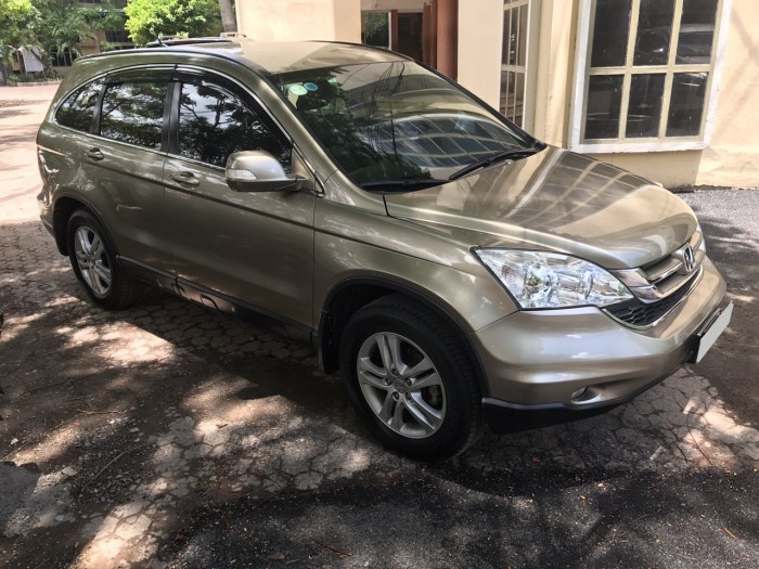 Bán xe Honda CRV còn mới, xe đẹp sx 2011 bản 2.4 tự động màu vàng cát.