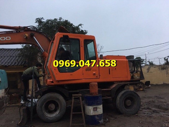 Kính Cabin Máy Xúc Lật Đào San Ủi