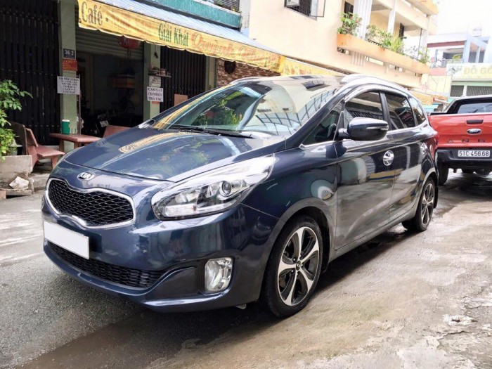 Cần bán gấp con Kia Rondo 2015 số tự động màu xanh đá Full opption