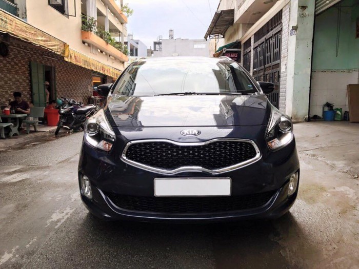 Cần bán gấp con Kia Rondo 2015 số tự động màu xanh đá Full opption