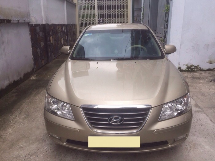 Cần bán xe Hyundai Sonata 2009 số sàn màu vàng