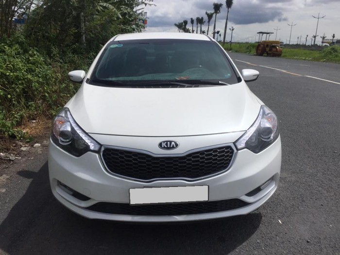Kia K3 1.6 2016 số sàn màu trắng xinh xắn lăn bánh