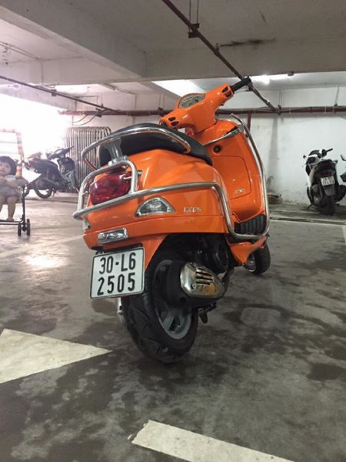 Cần bán Piaggio Vespa Lx mầu vàng cam dky 2010 chính chủ