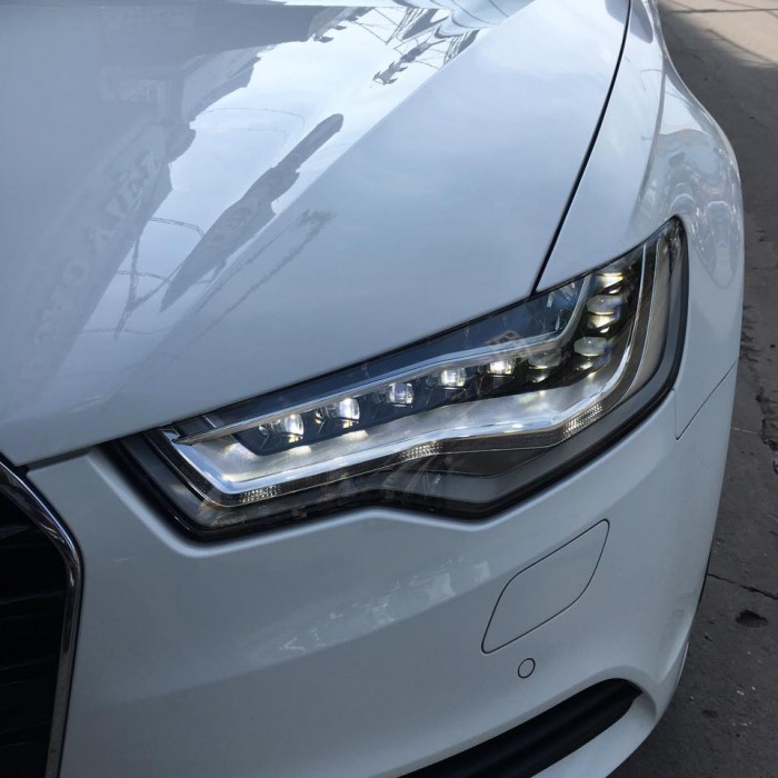 Cần bán chiếc Audi a6 2014 màu trắng zin từ trên xuống dưới 99%new