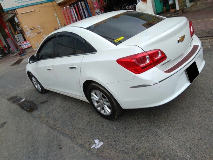 Bán xe Chevrolet Cruze LT 1.6 số sàn sx 2016 màu trắng sữa