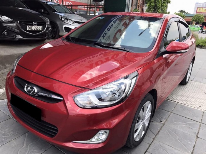 Cần bán Hyundai Accent 2012 tự động màu đỏ rất đẹp zin toàn bộ