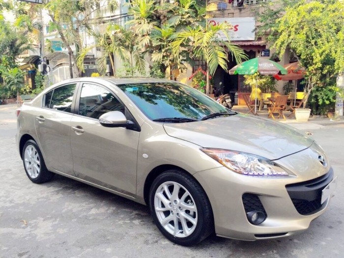 Bán nhanh Mazda 3S 2014 at màu vàng kim