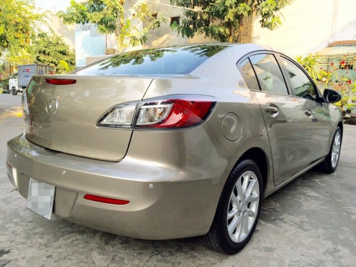 Bán nhanh Mazda 3S 2014 at màu vàng kim