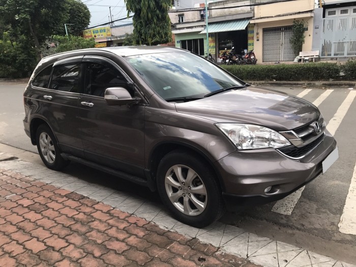 Nhà ít đi cần bán Honda CRV 2013 xe đẹp như mới màu nâu hồng tự động.