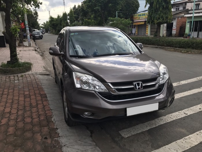 Nhà ít đi cần bán Honda CRV 2013 xe đẹp như mới màu nâu hồng tự động.