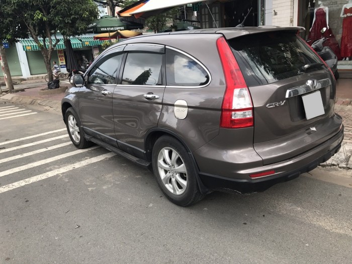 Nhà ít đi cần bán Honda CRV 2013 xe đẹp như mới màu nâu hồng tự động.