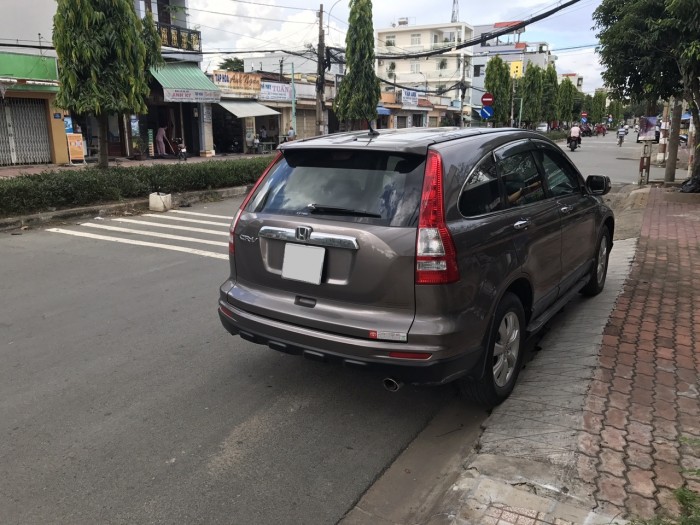 Nhà ít đi cần bán Honda CRV 2013 xe đẹp như mới màu nâu hồng tự động.