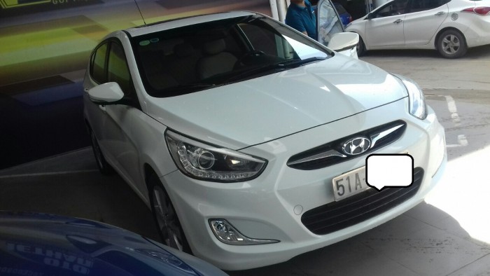 Bán Hyundai Accent Hatchback 1.4AT 2013 màu trắng bs tp đẹp mê ly