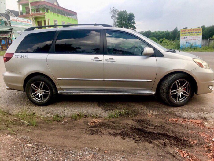 Bán Toyota Sienna XLE 3.5 vàng cát 2004 mua mới đập thùng